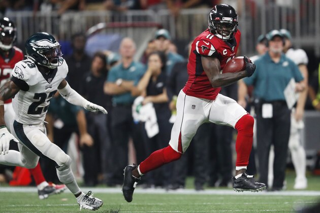 Atlanta Falcons wide receiver Julio Jones (11) runs toward the end zone for a touchdown against Philadelphia Eagles free safety Rodney McLeod (23) during the second half of an NFL football game, Sunday, Sept. 15, 2019, in Atlanta. (AP Photo/John Bazemore)