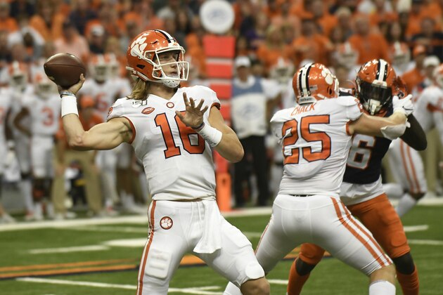 Clemson's quarterback Trevor Lawrence passes against Syracuse during the NCAA college football game Saturday, Sept. 14, 2019, in Syracuse, N.Y. (AP Photo/Steve Jacobs)