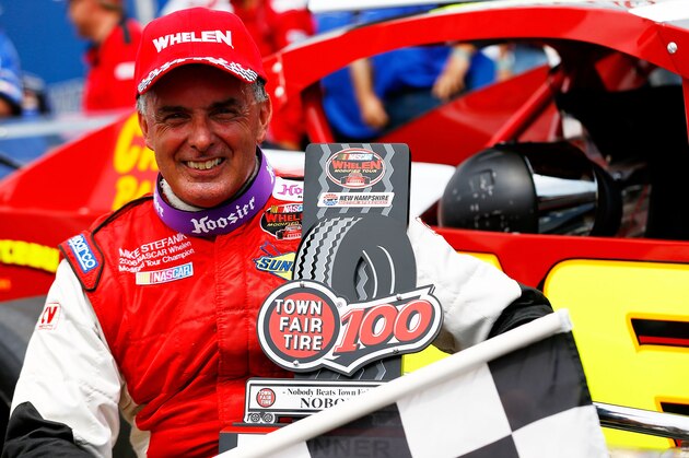 LOUDON, NH - JULY 14:  Mike Stefanik, driver of the #66 Canto & Sons Pvng/Robert B. Our Co. Ford, celebrates in Victory Lane after winning the NASCAR Whelen Modified Tour Town Fair Tire 100 at New Hampshire Motor Speedway on July 14, 2012 in Loudon, New Hampshire.  (Photo by Jared Wickerham/Getty Images for NASCAR)
