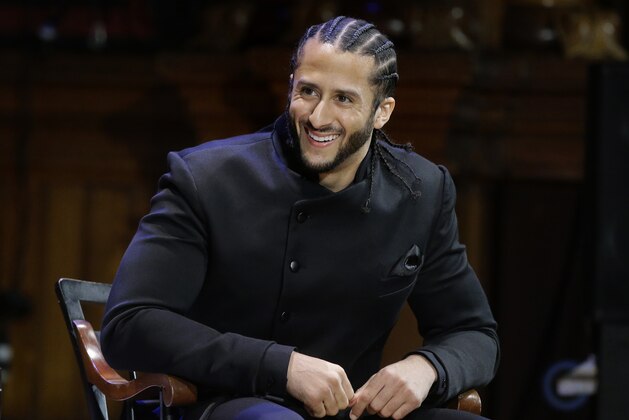 Former NFL football quarterback Colin Kaepernick is seated on stage during W.E.B. Du Bois Medal ceremonies, Thursday, Oct. 11, 2018, at Harvard University, in Cambridge, Mass. Kaepernick is among eight recipients of Harvard University's W.E.B. Du Bois Medals in 2018. Harvard has awarded the medal since 2000 to people whose work has contributed to African and African-American culture. (AP Photo/Steven Senne)