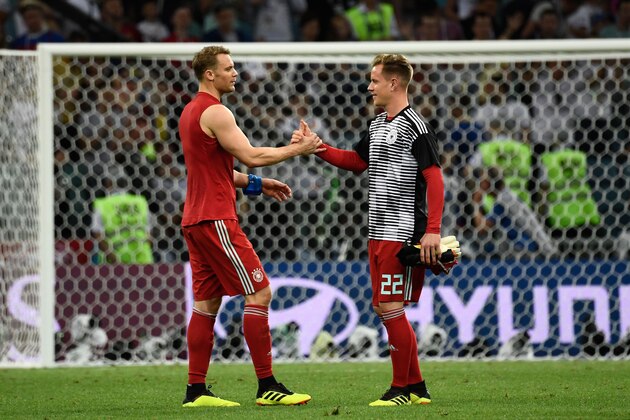 Germany's goalkeeper Manuel Neuer (L) speaks to Germany's goalkeeper Marc-Andre Ter Stegen following the Russia 2018 World Cup Group F football match between Germany and Sweden at the Fisht Stadium in Sochi on June 23, 2018. (Photo by Jonathan NACKSTRAND / AFP) / RESTRICTED TO EDITORIAL USE - NO MOBILE PUSH ALERTS/DOWNLOADS        (Photo credit should read JONATHAN NACKSTRAND/AFP/Getty Images)