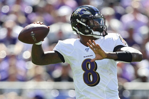 BALTIMORE, MARYLAND - SEPTEMBER 15: Quarterback Lamar Jackson #8 of the Baltimore Ravens looks to pass against the Arizona Cardinals during the first quarter at M&T Bank Stadium on September 15, 2019 in Baltimore, Maryland. (Photo by Patrick Smith/Getty Images)