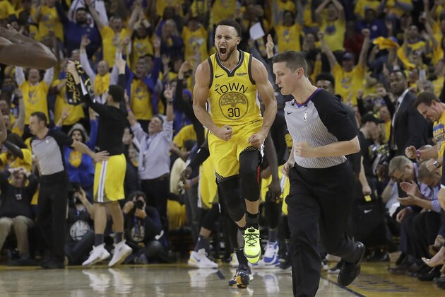 Golden State Warriors guard Stephen Curry (30) celebrates after scoring against the Los Angeles Clippers during the first half of Game 2 of a first-round NBA basketball playoff series in Oakland, Calif., Monday, April 15, 2019. (AP Photo/Jeff Chiu)