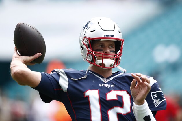 New England Patriots quarterback Tom Brady (12) warms up before an NFL football game against the Miami Dolphins, Sunday, Sept. 15, 2019, in Miami Gardens, Fla. (AP Photo/Brynn Anderson)