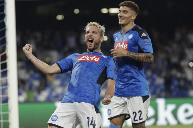 Napoli's Dries Mertens celebrates after scoring the opening goal of his team during the Champions League Group E soccer match between Napoli and Liverpool, at the San Paolo stadium in Naples, Italy, Tuesday, Sept. 17, 2019. (AP Photo/Gregorio Borgia)