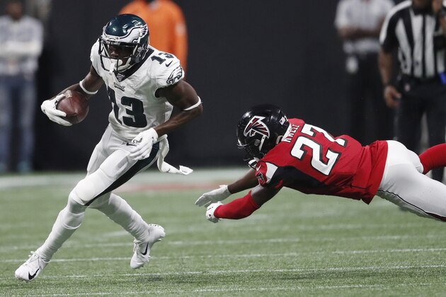 Philadelphia Eagles wide receiver Nelson Agholor (13) moves past Atlanta Falcons strong safety Damontae Kazee (27) during the second half of an NFL football game, Sunday, Sept. 15, 2019, in Atlanta. (AP Photo/John Bazemore)