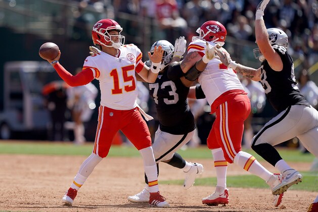 OAKLAND, CA - SEPTEMBER 15:  Patrick Mahomes #15 of the Kansas City Chiefs gets his pass off under pressure from Maurice Hurst #73 of the Oakland Raiders during the second quarter of an NFL football game at RingCentral Coliseum on September 15, 2019 in Oakland, California.  (Photo by Thearon W. Henderson/Getty Images)