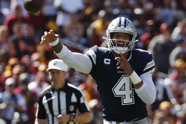 Dallas Cowboys quarterback Dak Prescott (4) passes downfield during the second half of an NFL football game, Sunday, Sept. 15, 2019, in Landover, Md. (AP Photo/Alex Brandon)