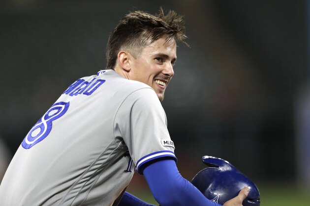 Toronto Blue Jays' Cavan Biggio looks toward the dugout after hitting a triple to complete the cycle, off Baltimore Orioles relief pitcher Mychal Givens during the ninth inning of a baseball game Tuesday, Sept. 17, 2019, in Baltimore. The Blue Jays won 8-5. (AP Photo/Julio Cortez)