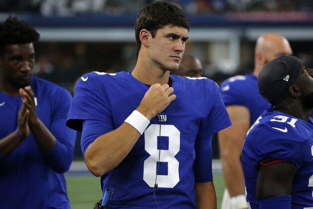 New York Giants quarterback Daniel Jones (8) watches play against the Dallas Cowboys from the sideline in the second half of a NFL football game in Arlington, Texas, Sunday, Sept. 8, 2019. (AP Photo/Michael Ainsworth)