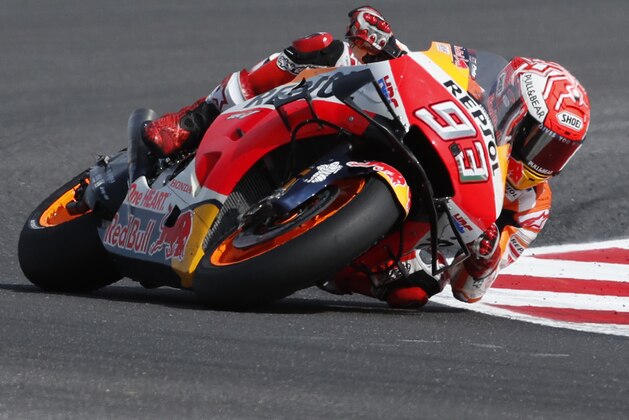 Race winner Spain's Marc Marquez steers his motorbike during the San Marino Motorcycle Grand Prix at the Misano circuit in Misano Adriatico, Italy, Sunday, Sept. 15, 2019. (AP Photo/Antonio Calanni)