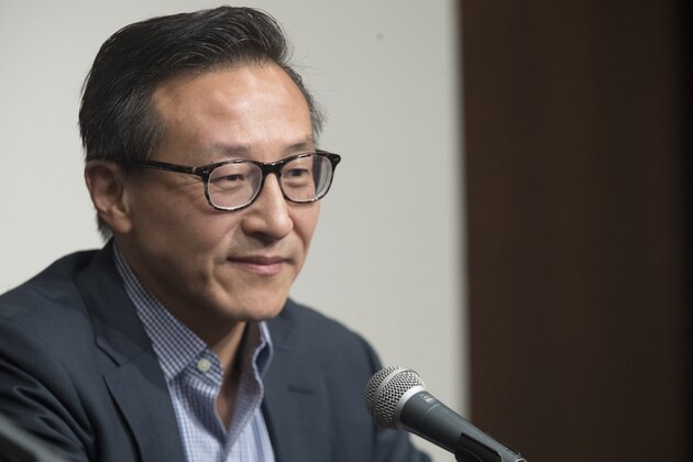 Joe Tsai, co-founder and executive vice chairman of Alibaba Group and the new owner of the New York Liberty, speaks to reporters during a news conference before a WNBA exhibition basketball game between the New York Liberty and China, Thursday, May 9, 2019 in New York. Tsai saw the team's exhibition game against the Chinese national team Thursday night as a chance to grow relations between the two countries. (AP Photo/Mary Altaffer)