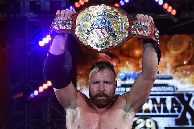 TOKYO, JAPAN – AUGUST 12:Jon Moxley lifts the belt during the New Japan Pro-Wrestling G1 Climax 29 at Nippon Budokan on August 12, 2019 in Tokyo, Japan.(Photo by Etsuo Hara/Getty Images)