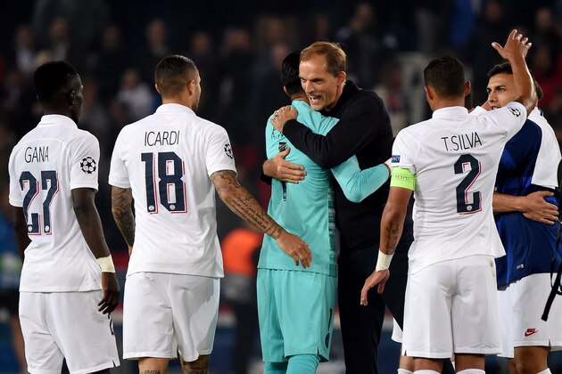 Paris Saint-Germain's German coach Thomas Tuchel (C) celebrate with his players after winning in the UEFA Champions league Group A football match between Paris Saint-Germain and Real Madrid, at the Parc des Princes stadium, in Paris, on September 18, 2019. (Photo by Lucas BARIOULET / AFP)        (Photo credit should read LUCAS BARIOULET/AFP/Getty Images)