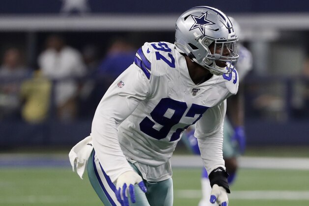 Dallas Cowboys defensive end Taco Charlton rushes the line during the first half of a preseason NFL football game against the Houston Texans in Arlington, Texas, Saturday, Aug. 24, 2019. (AP Photo/Roger Steinman)