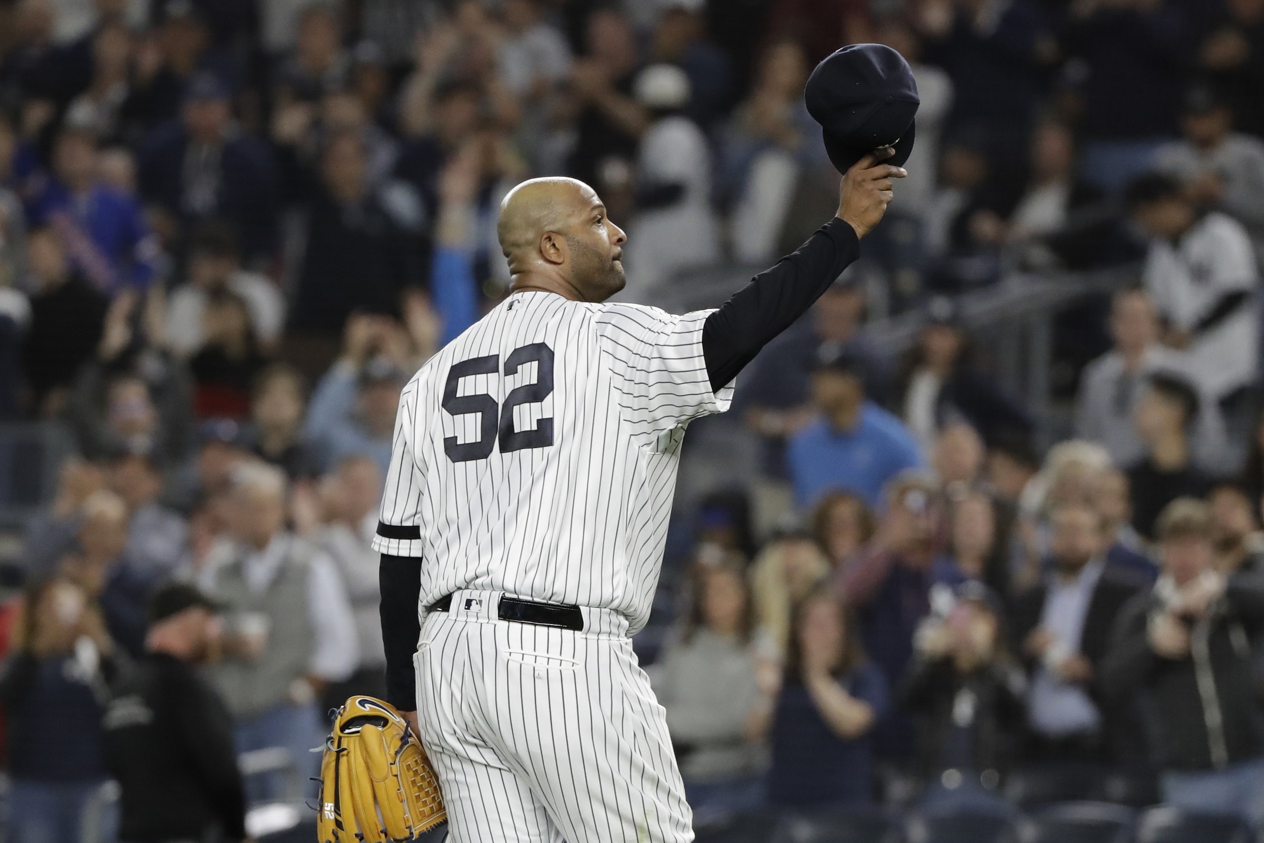 New York Yankees starting pitcher CC Sabathia gestures to fans as he leaves during the third inning of the team's baseball game against the Los Angeles Angels on Wednesday, Sept. 18, 2019, in New York. (AP Photo/Frank Franklin II) New York Yankees starting pitcher CC Sabathia gestures to fans as he leaves during the third inning of the team's baseball game against the Los Angeles Angels on Wednesday, Sept. 18, 2019, in New York. (AP Photo/Frank Franklin II)