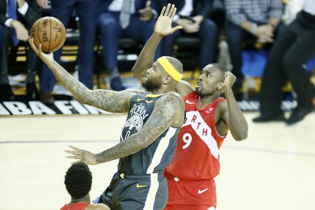OAKLAND, CA - JUNE 13: DeMarcus Cousins #0 of the Golden State Warriors goes to the basket against the Toronto Raptors during Game Six of the NBA Finals on June 13, 2019 at ORACLE Arena in Oakland, California. NOTE TO USER: User expressly acknowledges and agrees that, by downloading and/or using this photograph, user is consenting to the terms and conditions of Getty Images License Agreement. Mandatory Copyright Notice: Copyright 2019 NBAE (Photo by Chris Elise/NBAE via Getty Images)