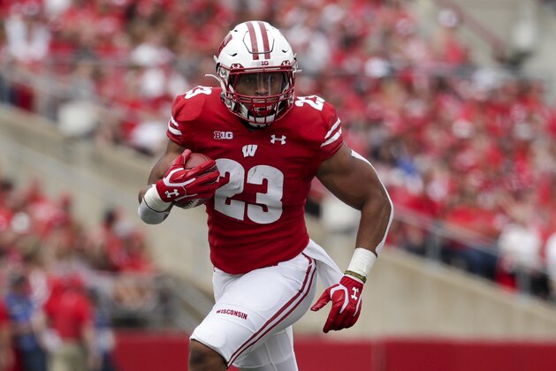 Wisconsin's Jonathan Taylor runs during the first half of an NCAA college football game against Central Michigan Saturday, Sept. 7, 2019, in Madison, Wis. (AP Photo/Morry Gash)