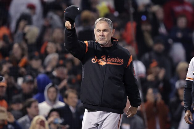 San Francisco Giants manager Bruce Bochy tips his cap after the Giants defeated the Boston Red Sox 11-3 in a baseball game for his 2,000th career win, at Fenway Park in Boston, Wednesday, Sept. 18, 2019. (AP Photo/Charles Krupa)