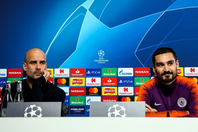 MANCHESTER, ENGLAND - MARCH 11: Ilkay Gundogan of Manchester City and Pep Guardiola the head coach / manager of Manchester City   during the Manchester City Press Conference & Training Session ahead of their UEFA Champions League Round of 16 Second leg match against Schalke 04 at Manchester City Football Academy on March 11, 2019 in Manchester, England. (Photo by Robbie Jay Barratt - AMA/Getty Images)