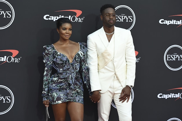 Gabrielle Union, left, and Dwyane Wade arrive at the ESPY Awards on Wednesday, July 10, 2019, at the Microsoft Theater in Los Angeles. (Photo by Jordan Strauss/Invision/AP)