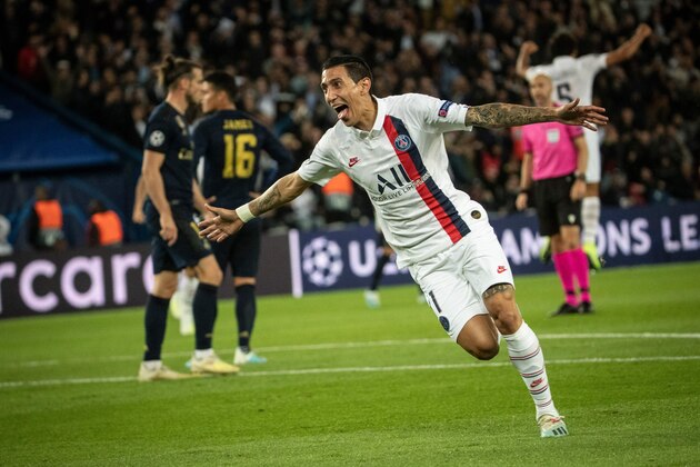 Paris Saint-Germain's Argentine midfielder Angel Di Maria celebrates scoring his team's second goal during the UEFA Champions league Group A football match between Paris Saint-Germain and Real Madrid, at the Parc des Princes stadium, in Paris, on September 18, 2019. (Photo by Thomas SAMSON / AFP)        (Photo credit should read THOMAS SAMSON/AFP/Getty Images)