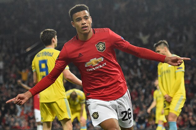 Manchester United's striker Mason Greenwood celebrates after scoring the opening goal of the UEFA Europa League Group L football match between Manchester United and Astana at Old Trafford in Manchester, north west England, on September 19, 2019. (Photo by Oli SCARFF / AFP)        (Photo credit should read OLI SCARFF/AFP/Getty Images)
