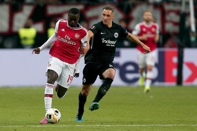 FRANKFURT AM MAIN, GERMANY - SEPTEMBER 19: Nicolas Pepe of FC Arsenal and Dominik Kohr of Eintracht Frankfurt battle for the ball during the UEFA Europa League group F match between Eintracht Frankfurt and Arsenal FC on September 19, 2019 in Frankfurt am Main, Germany. (Photo by TF-Images/Getty Images)