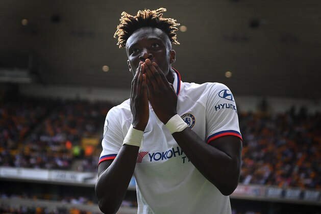 WOLVERHAMPTON, ENGLAND - SEPTEMBER 14: Tammy Abraham of Chelsea celebrates after scoring his team's fourth goal uring the Premier League match between Wolverhampton Wanderers and Chelsea FC at Molineux on September 14, 2019 in Wolverhampton, United Kingdom. (Photo by Clive Mason/Getty Images)