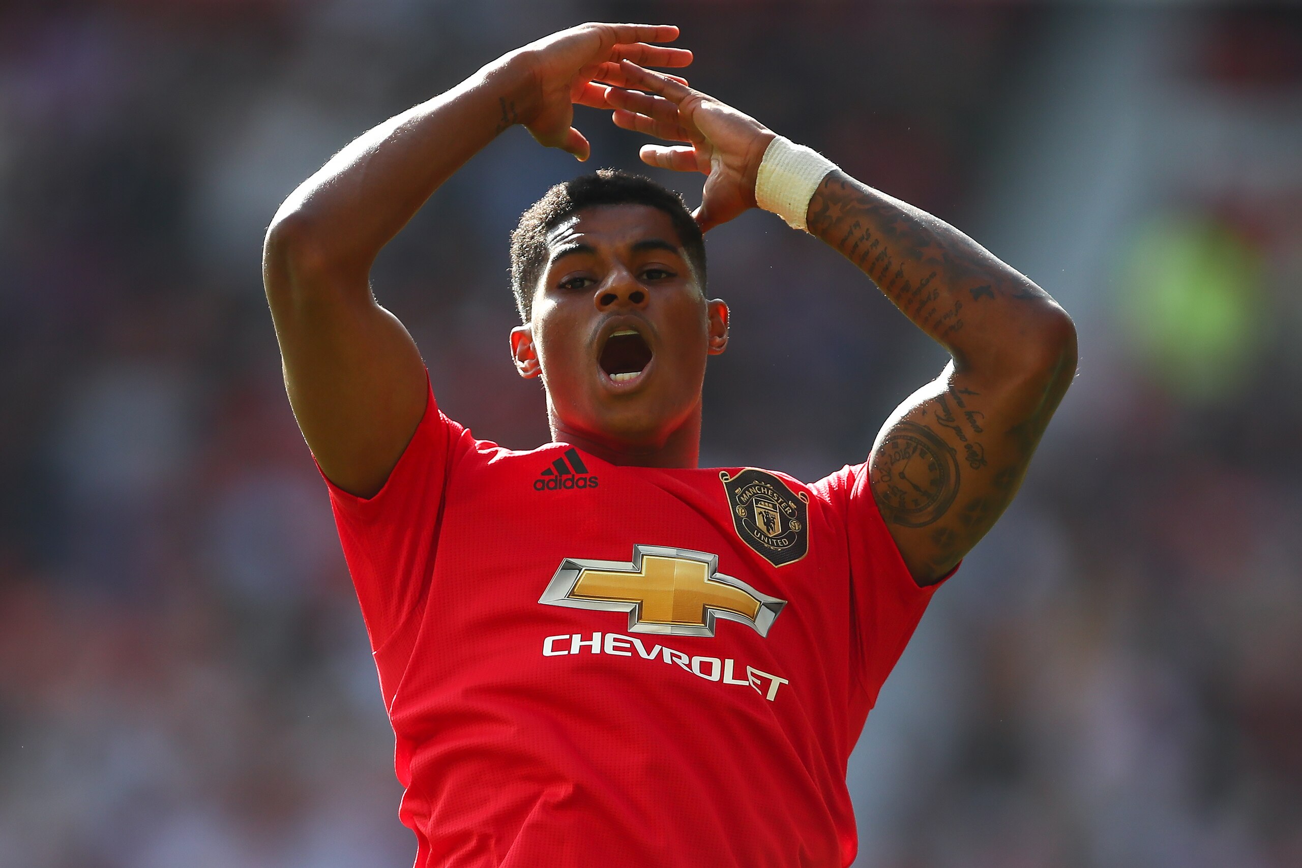 MANCHESTER, ENGLAND - SEPTEMBER 14: Marcus Rashford of Manchester United celebrates after scoring a goal to make it 1-0 during the Premier League match between Manchester United and Leicester City at Old Trafford on September 14, 2019 in Manchester, United Kingdom. (Photo by Robbie Jay Barratt - AMA/Getty Images)