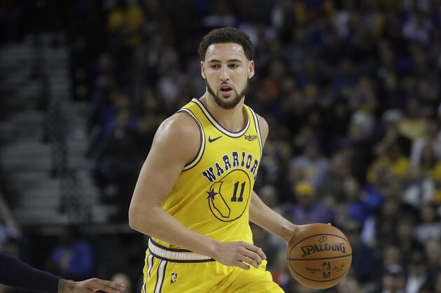 Golden State Warriors guard Klay Thompson (11) against the Denver Nuggets during an NBA basketball game in Oakland, Calif., Tuesday, April 2, 2019. (AP Photo/Jeff Chiu)