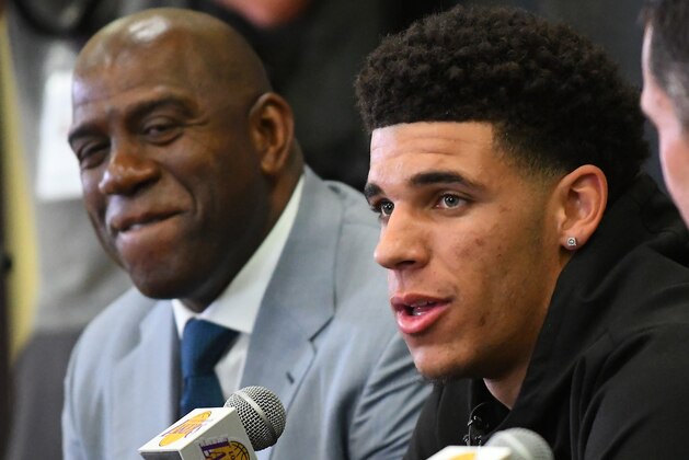 LOS ANGELES, CA - JUNE 23:  Lonzo Ball and Magic Johnson, president of basketball operations, of the Los Angeles Lakers talk to the media during a press conference on June 23, 2017 at the team training faculity in Los Angeles, California.  (Photo by Jayne Kamin-Oncea/Getty Images)