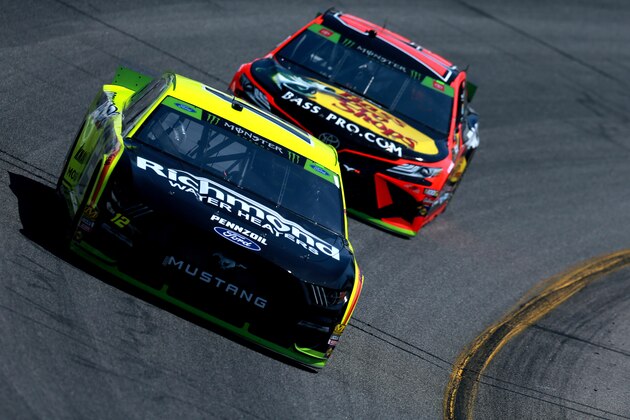 RICHMOND, VIRGINIA - SEPTEMBER 20: Ryan Blaney, driver of the #12 Menards/Richmond Ford, races Martin Truex Jr., driver of the #19 Bass Pro Shops Toyota, during practice for the Monster Energy NASCAR Cup Series Federated Auto Parts 400 at Richmond Raceway on September 20, 2019 in Richmond, Virginia. (Photo by Sean Gardner/Getty Images)