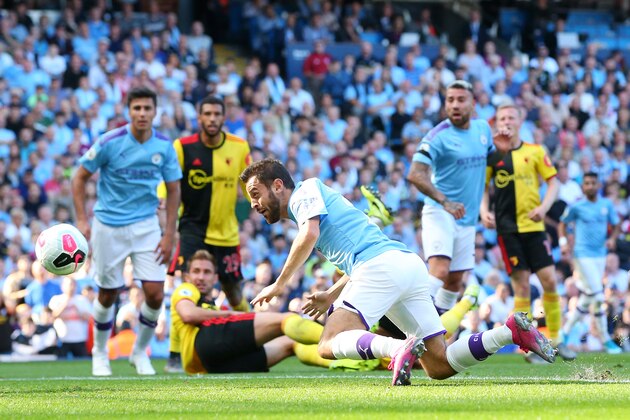 MANCHESTER, ENGLAND - SEPTEMBER 21:  Bernardo Silva of Manchester City scores his team's fourth goal during the Premier League match between Manchester City and Watford FC at Etihad Stadium on September 21, 2019 in Manchester, United Kingdom. (Photo by Alex Livesey/Getty Images)