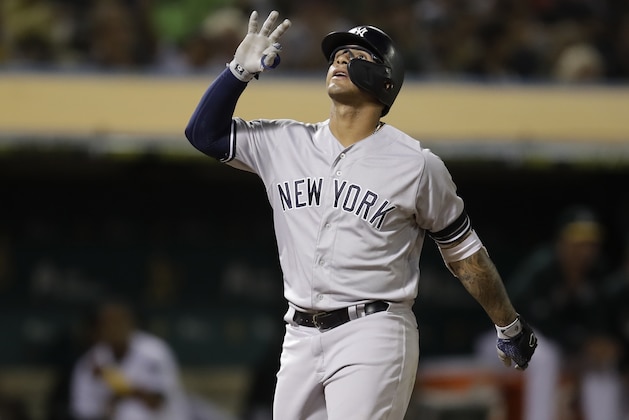 New York Yankees' Gleyber Torres celebrates after hitting a home run off Oakland Athletics' Tanner Roark during the seventh inning of a baseball game Thursday, Aug. 22, 2019, in Oakland, Calif. (AP Photo/Ben Margot)