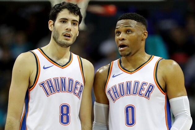 CHARLOTTE, NC - NOVEMBER 01:  Russell Westbrook #0 talks to teammate Alex Abrines #8 of the Oklahoma City Thunder against the Charlotte Hornets during their game at Spectrum Center on November 1, 2018 in Charlotte, North Carolina. NOTE TO USER: User expressly acknowledges and agrees that, by downloading and or using this photograph, User is consenting to the terms and conditions of the Getty Images License Agreement.  (Photo by Streeter Lecka/Getty Images)