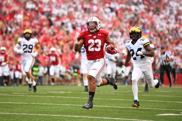MADISON, WISCONSIN - SEPTEMBER 21:  Jonathan Taylor #23 of the Wisconsin Badgers rushes for a touchdown during the first half against the Michigan Wolverines at Camp Randall Stadium on September 21, 2019 in Madison, Wisconsin. (Photo by Stacy Revere/Getty Images)
