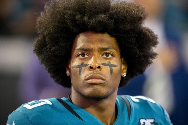 Jacksonville Jaguars cornerback Jalen Ramsey stands on the sideline during the opening ceremonies of an NFL football game between the Jacksonville Jaguars and the Tennessee Titans, Thursday, Sept. 19, 2019, in Jacksonville, Fla. (AP Photo/Stephen B. Morton)