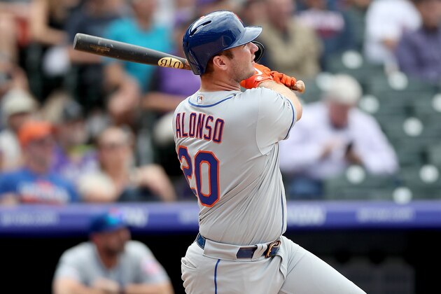 DENVER, COLORADO - SEPTEMBER 18: Pete Alonso #20 of the New York Mets hits a solo home run in the sixth inning against the Colorado Rockies at Coors Field on September 18, 2019 in Denver, Colorado. (Photo by Matthew Stockman/Getty Images)