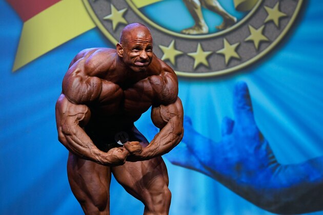 TOPSHOT - Slovak bodybuilder Michal Krizanek flexes his muscles for the judges during the Arnold Classic Europe 2019 bodybuilding competition in Barcelona on September 21, 2019. (Photo by LLUIS GENE / AFP)        (Photo credit should read LLUIS GENE/AFP/Getty Images)