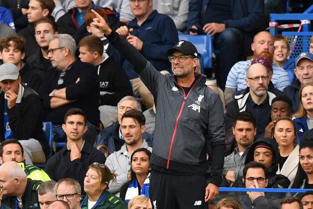Liverpool's German manager Jurgen Klopp gestures on the touchline during the English Premier League football match between Chelsea and Liverpool at Stamford Bridge in London on September 22, 2019. (Photo by OLLY GREENWOOD / AFP) / RESTRICTED TO EDITORIAL USE. No use with unauthorized audio, video, data, fixture lists, club/league logos or 'live' services. Online in-match use limited to 120 images. An additional 40 images may be used in extra time. No video emulation. Social media in-match use limited to 120 images. An additional 40 images may be used in extra time. No use in betting publications, games or single club/league/player publications. /         (Photo credit should read OLLY GREENWOOD/AFP/Getty Images)