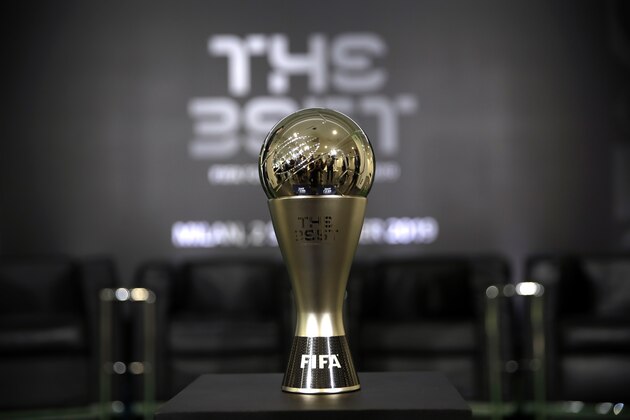 A reproduction of the cup for the FIFA best player award is displayed during a press conference at the San Siro stadium in Milan, Italy, Monday, Sept. 2, 2019. Five-time winners Cristiano Ronaldo and Lionel Messi, and Virgil van Dijk are the three finalists for the FIFA best player award. United States forward Megan Rapinoe is the favorite for the women's award. The ceremony will be held at the La Scala theatre in Milan on Sep.23. (AP Photo/Luca Bruno)