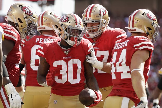 San Francisco 49ers running back Jeff Wilson Jr. (30) celebrates with teammates after scoring against the Pittsburgh Steelers during the second half of an NFL football game in Santa Clara, Calif., Sunday, Sept. 22, 2019. (AP Photo/Ben Margot)