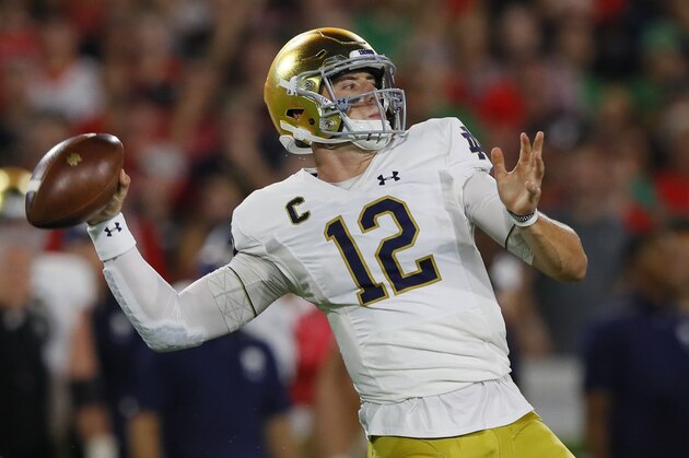 ATHENS, GEORGIA - SEPTEMBER 21: Ian Book #12 of the Notre Dame Fighting Irish throws a first half pass while playing the Georgia Bulldogs at Sanford Stadium on September 21, 2019 in Athens, Georgia. (Photo by Kevin C. Cox/Getty Images) ATHENS, GEORGIA - SEPTEMBER 21: Ian Book #12 of the Notre Dame Fighting Irish throws a first half pass while playing the Georgia Bulldogs at Sanford Stadium on September 21, 2019 in Athens, Georgia. (Photo by Kevin C. Cox/Getty Images)