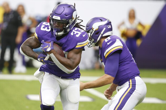 Minnesota Vikings running back Dalvin Cook (33) runs up field during the first half of an NFL football game against the Oakland Raiders, Sunday, Sept. 22, 2019, in Minneapolis. (AP Photo/Bruce Kluckhohn)
