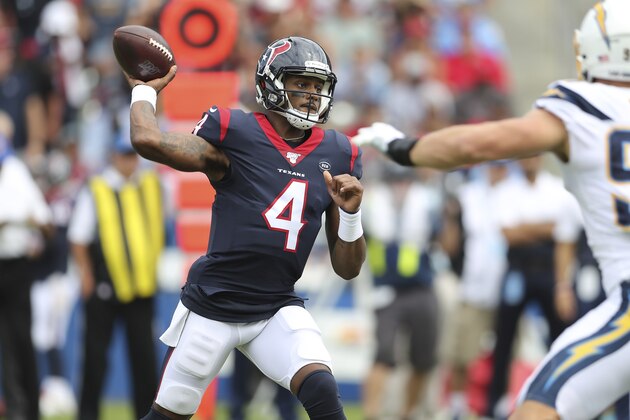 Houston Texans quarterback Deshaun Watson (4) makes a pass attempt as Los Angeles Chargers defensive end Joey Bosa (97) adds pressure in the first half during the American Football game between the Houston Texans and the Los Angeles Chargers at the Dignity Health Sports Park in Carson, California, USA, 22 September 2019.