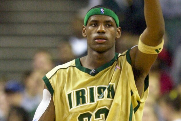 Akron St. Vincent-St. Marys high school star LeBron James holds up one finger during the team's 65-45 win over Virginia's Oak Hill Academy Thursday, Dec. 12, 2002, in Cleveland. James gesture proved prophetic as USA Today named the Irish the top high school basketball team in the country Tuesday, Jan. 7, 2003. (AP Photo/Mark Duncan, File)
