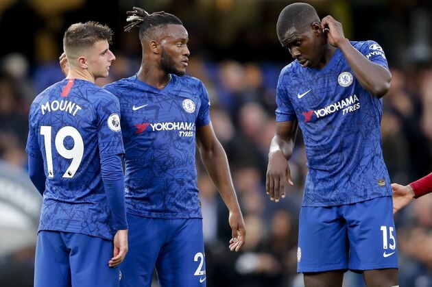 From left, Chelsea's Mason Mount, Michy Batshuayi and Kurt Zouma react at the end of the British Premier League soccer match between Chelsea and Liverpool, at the Stamford Bridge Stadium, London, Sunday, Sept. 22, 2019. Liverpool won 2-1. (AP Photo/Frank Augstein)