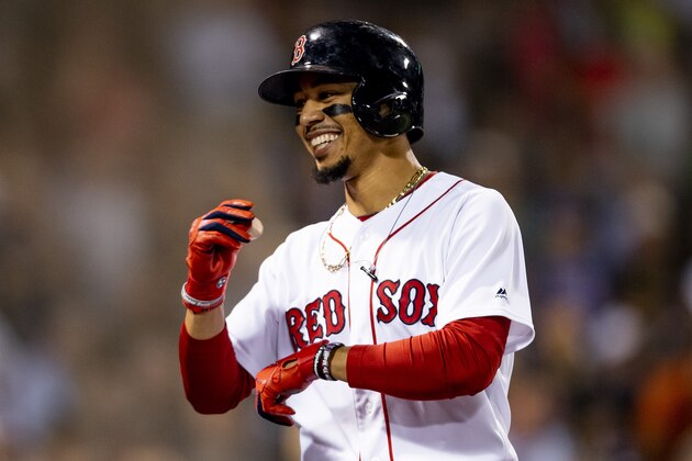 BOSTON, MA - SEPTEMBER 4: Mookie Betts #50 of the Boston Red Sox reacts after hitting a three run home run during the second inning of a game against the Minnesota Twins on September 4, 2019 at Fenway Park in Boston, Massachusetts. It was his second home run of the game. (Photo by Billie Weiss/Boston Red Sox/Getty Images)