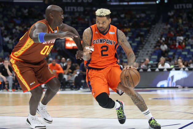 NEW ORLEANS, LOUISIANA - AUGUST 25: Andre Emmett #2 of 3's Company dribbles the ball as Dion Glover #00 of Bivouac defends  during the BIG3 Playoffs at Smoothie King Center on August 25, 2019 in New Orleans, Louisiana. (Photo by Chris Graythen/BIG3 via Getty Images)